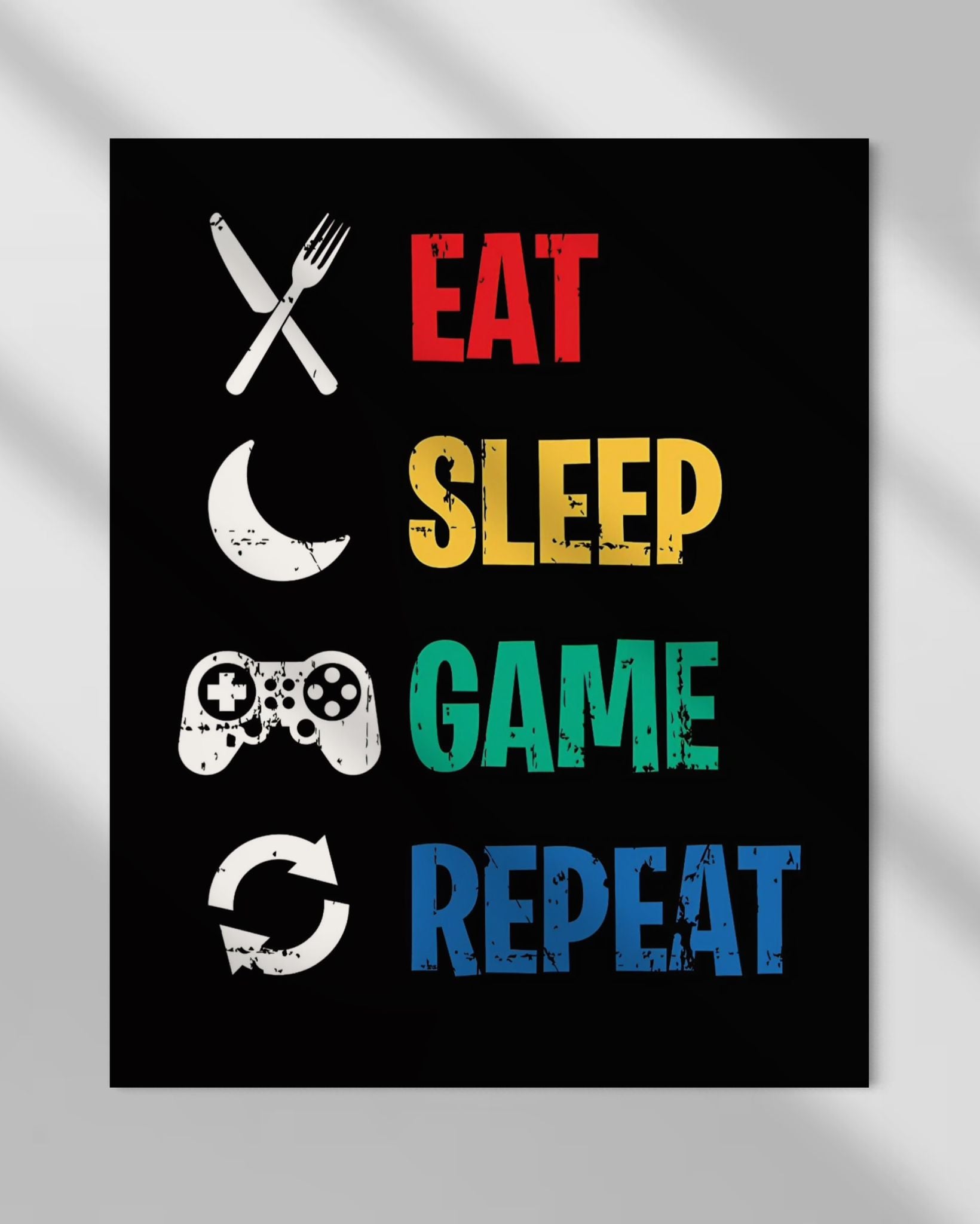 Wandkunst „Eat Sleep Game Repeat 2“.