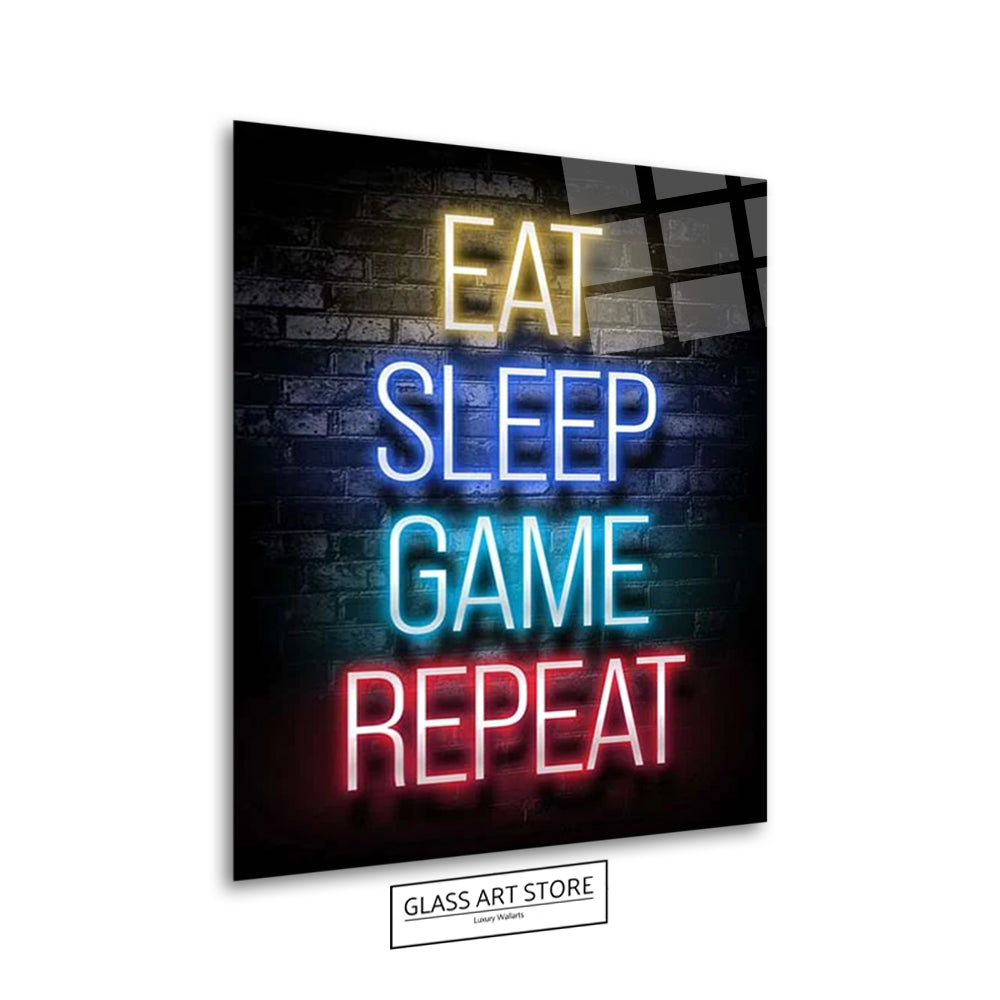 Wandkunst „Eat Sleep Game Repeat“.